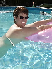 Sexy short-haired granny with big tits