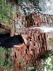 Pretty Thai woman with big natural breasts and long nipples.