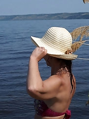 A gallery of women showcasing their legs on a wooden stage