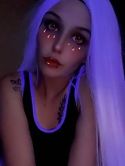 Three individuals engaging in urine play at a sexual health clinic