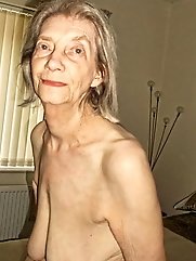 Aroused aged grandma is spreading her hips